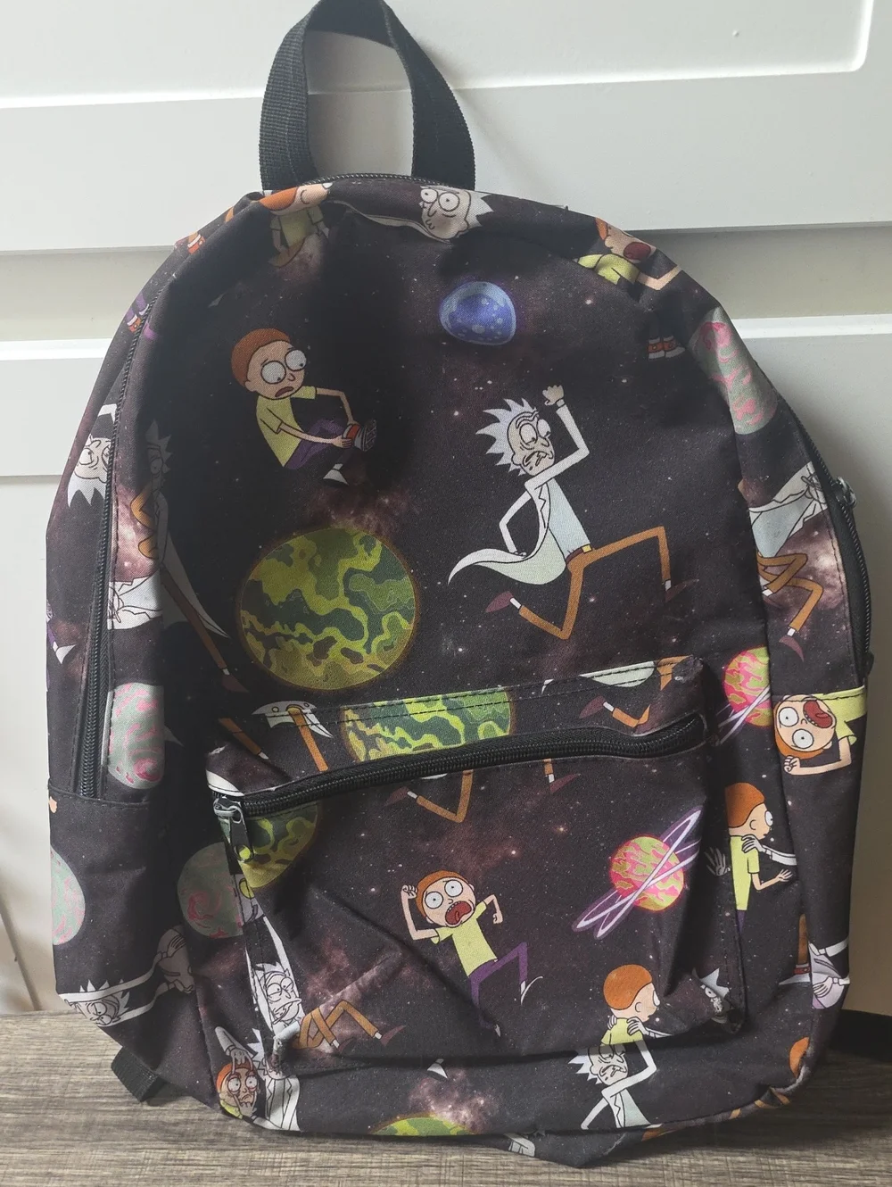 Bioworld Rick and Morty Graphic Backpack - Black with Purple Accents